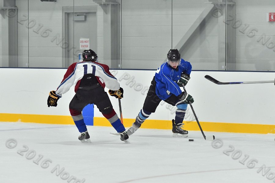 Wheaton College Men\'s Ice Hockey vs Middlesex Community College. - Photo By: KEITH NORDSTROM